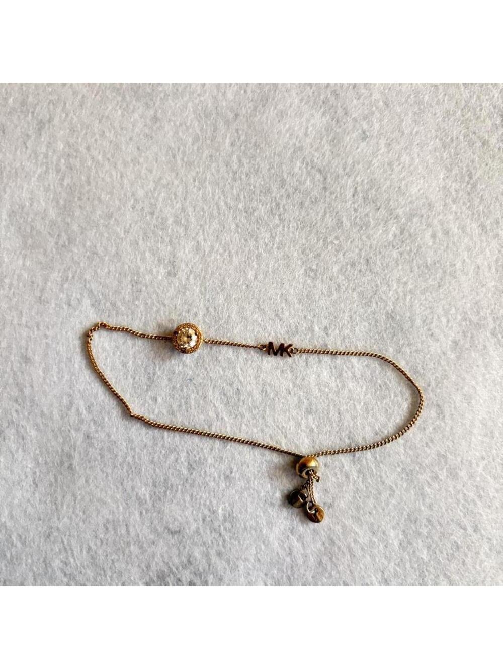 MICHAEL KORS GOLD BRACELET